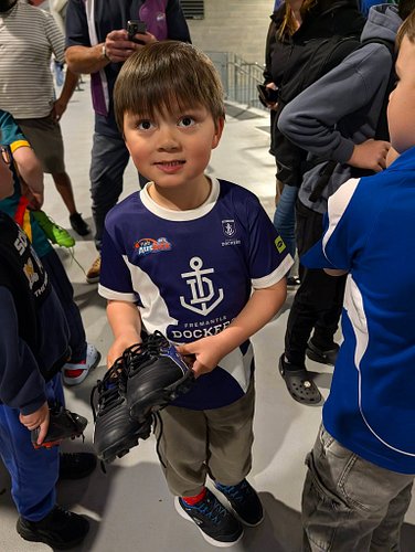 A pretty special moment tonight. 💜🏉

Oscar played his **first Auskick game on the Optus Stadium turf** at half time during th...