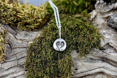 This sterling silver heart drop pendant is the perfect symbol of love and elegance. Its sweet, delicate design makes it a tim...