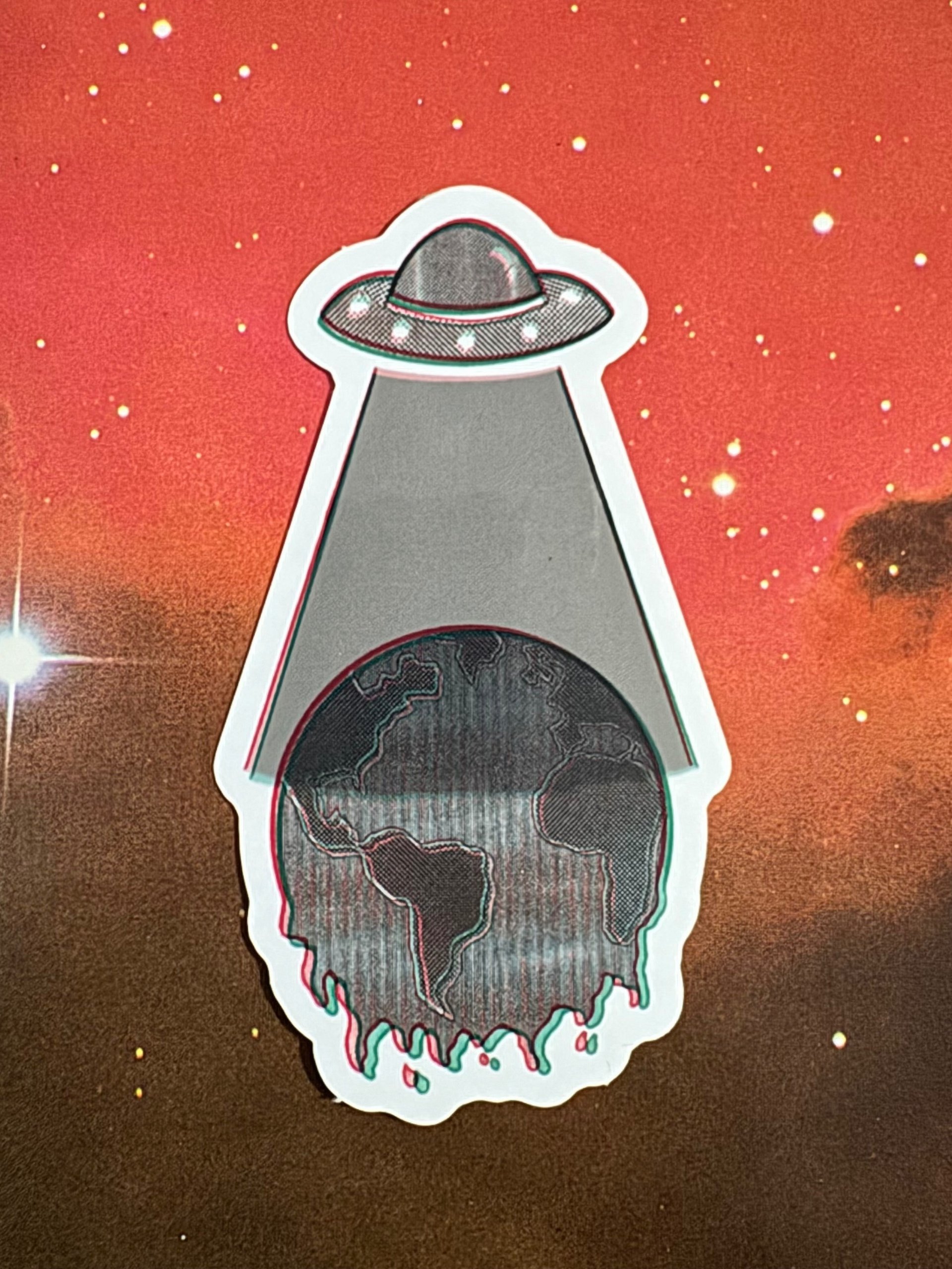 Melted Earth Abduction Sticker product image (1)