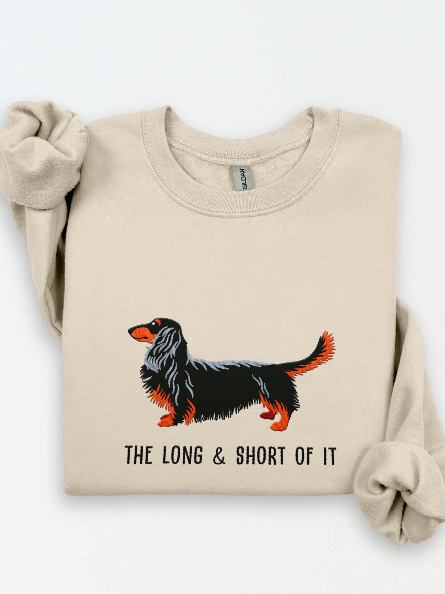 The Long & Short of It Sweatshirt (Embroidered) of a Longhaired Dachshund(Black & Tan) product image (1)