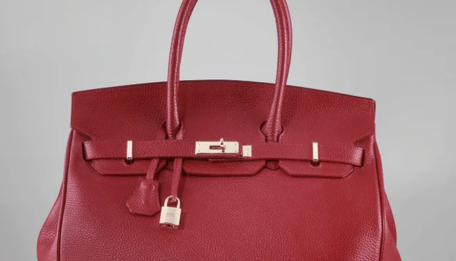 Maroon Designer Leather Bag with Gold Buckles product image (1)