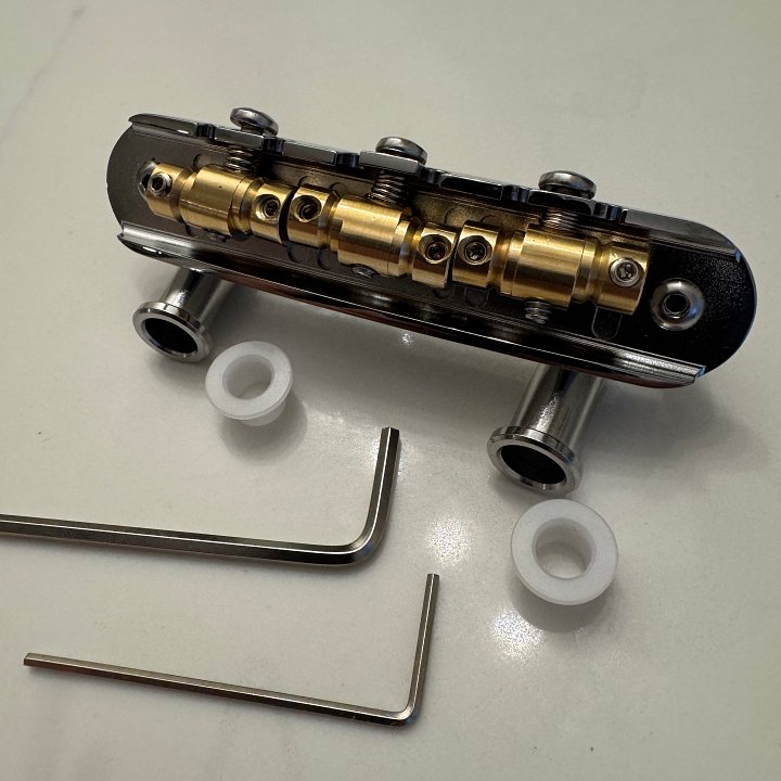 “The Goliath” Chrome-Plated Brass Jazzmaster / Jaguar / Mustang Bridge with USA Made Compensated Raw Brass Saddles product image (1)