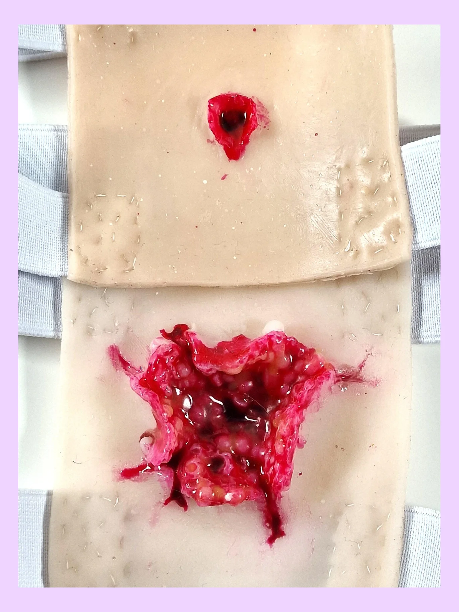 Wearable Hyperrealistic Bullet Wound Training Pads (Set of 2) product image (1)