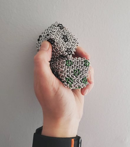 only thing between me and these two jelly cube dice being in the shop is taking some better looking photos. soon!

#chainmail...