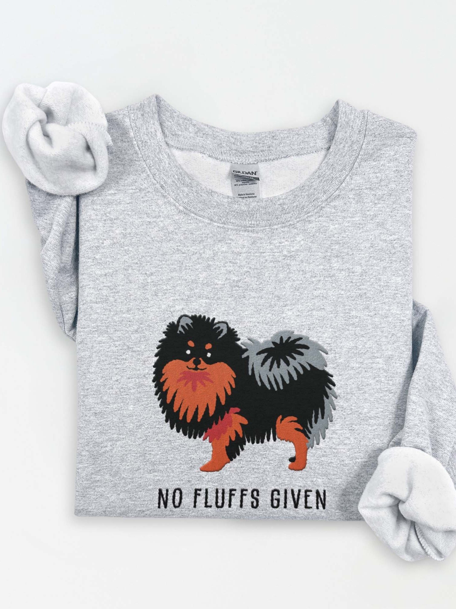 No Fluffs Given Sweatshirt (Embroidered) of a Pomeranian(Black & Tan) product image (1)