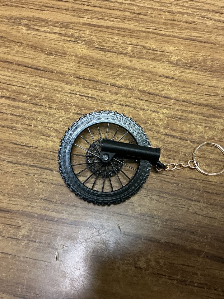 Working Surron wheel keychain product image (2)