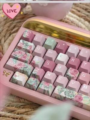 These #keycaps 😍 Linking them in the tree, I’m gettin ‘em! Sooooo my vibe. 🩷🌱 #gamergirl #keyboard #fyp #custom 
