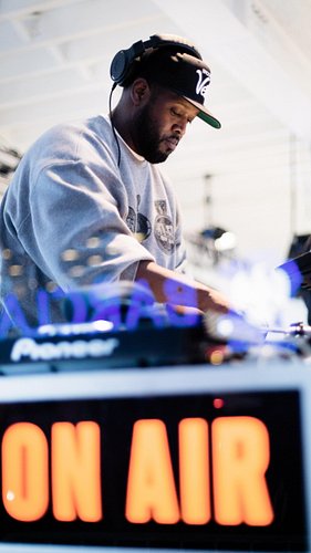 DJ Clark Kent puts on a live set at 166 Flatbush Ave in Brooklyn during a Jordan Brand pop-up held alongside the 15th edition...