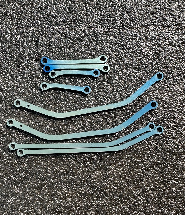 Custom Anodized Ti Transmissions, links, plates, etc product image (1)