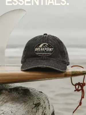 Not just a cap. Not just a board. Just a reminder that life feels better somewhere near the ocean 🌊 Would you wear this on a surf trip? 👀 #BreakpointSurfCo #SurfLifestyle #CoastalVibes #BeachAesthetic #surfculture 