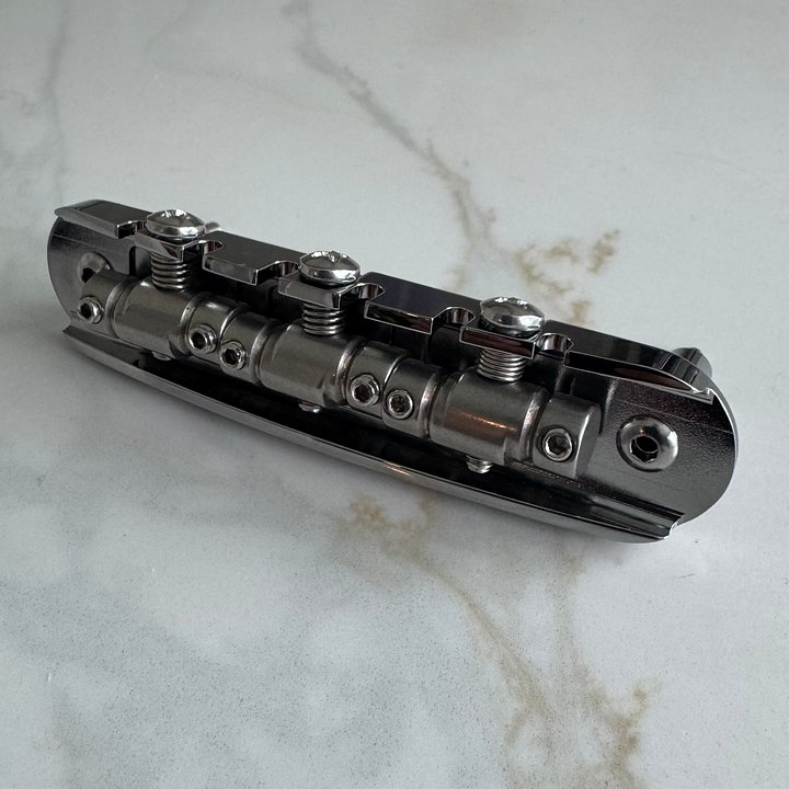 “The Goliath” Chrome-Plated Brass Jazzmaster / Jaguar / Mustang Bridge with USA Made Compensated Stainless Steel Saddles product image (2)