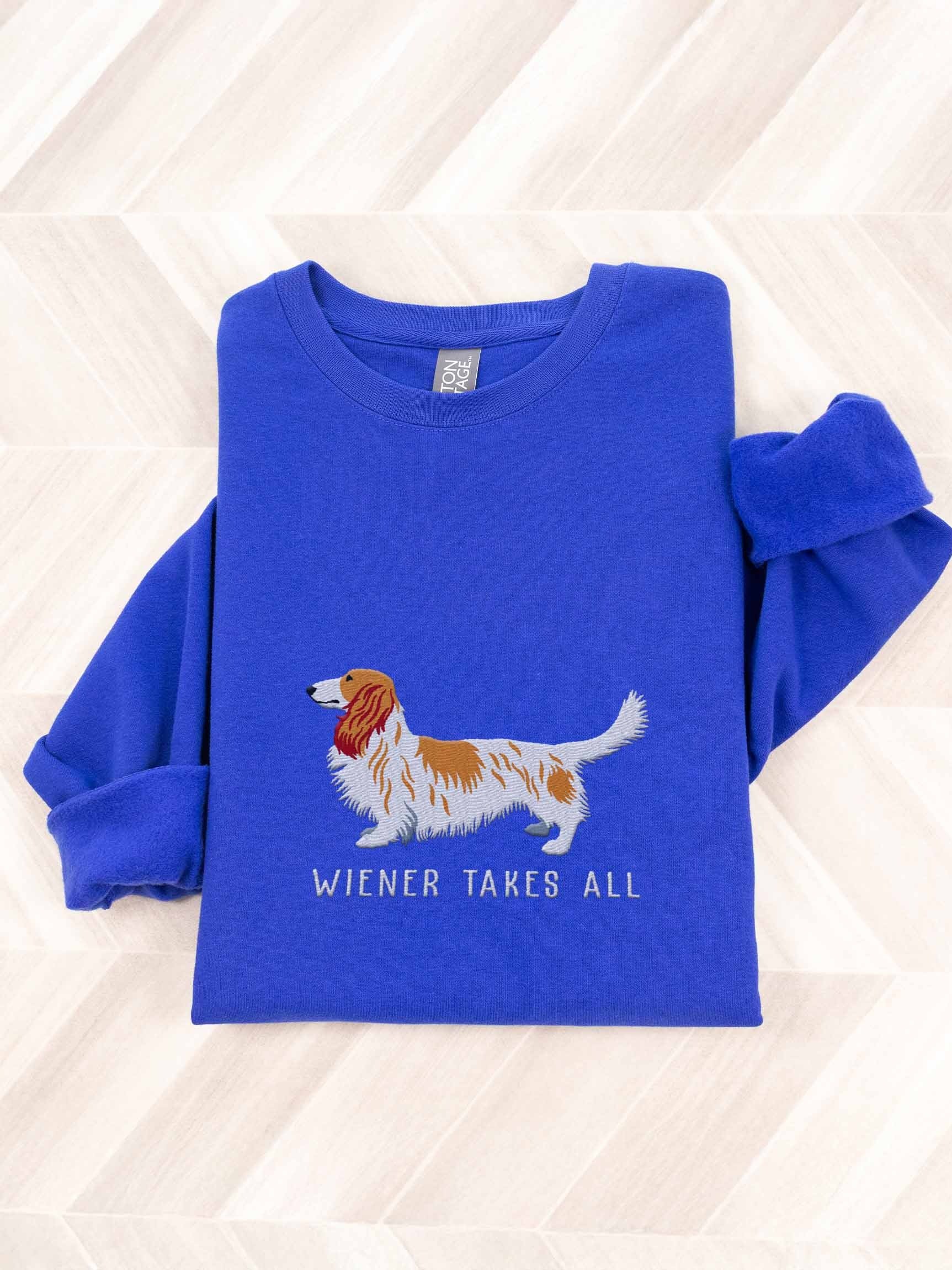 Wiener Takes All Sweatshirt (Embroidered) of a Longhaired Dachshund(Pied Brown & White) product image (1)