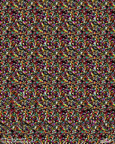Something tiny is hidden in this picture. What is it ?