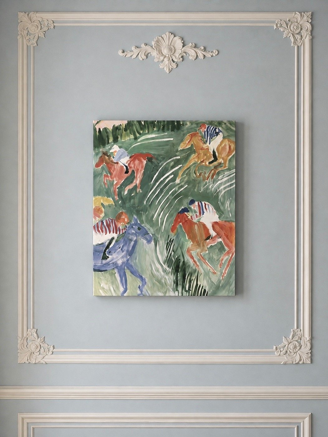 The Gallop I equestrian canvas positioned in a layered interior