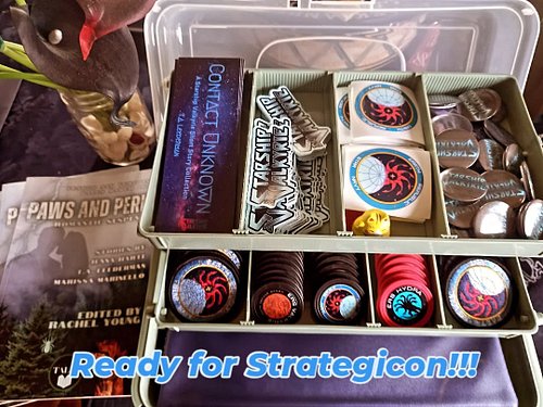 Ready for @stratcon with Starship Valkyrie goodies and lots of copies of the romantic suspense zine PAWS AND PERIL from @tend...