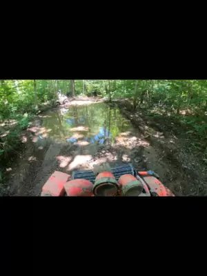 POV: YOUR ATV IS YOUR HAPPY PLACE 😂💦 Mud on the machine. Water on the trail. No plans to turn around! 🤘🛞 Would you ride this? 👇 #ATVBUDS #ATV #MudRiding #CanAm #POV