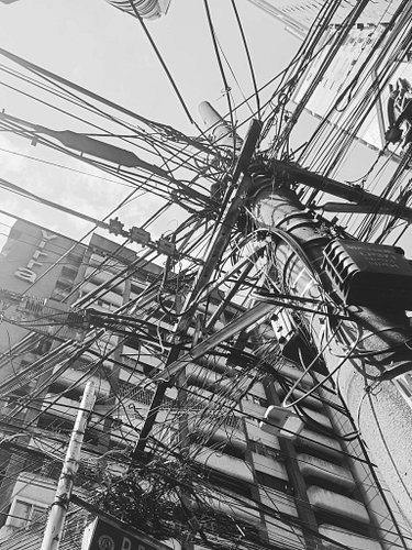 Manila, like most Southeast Asian cities have the most fascinating electrical work.