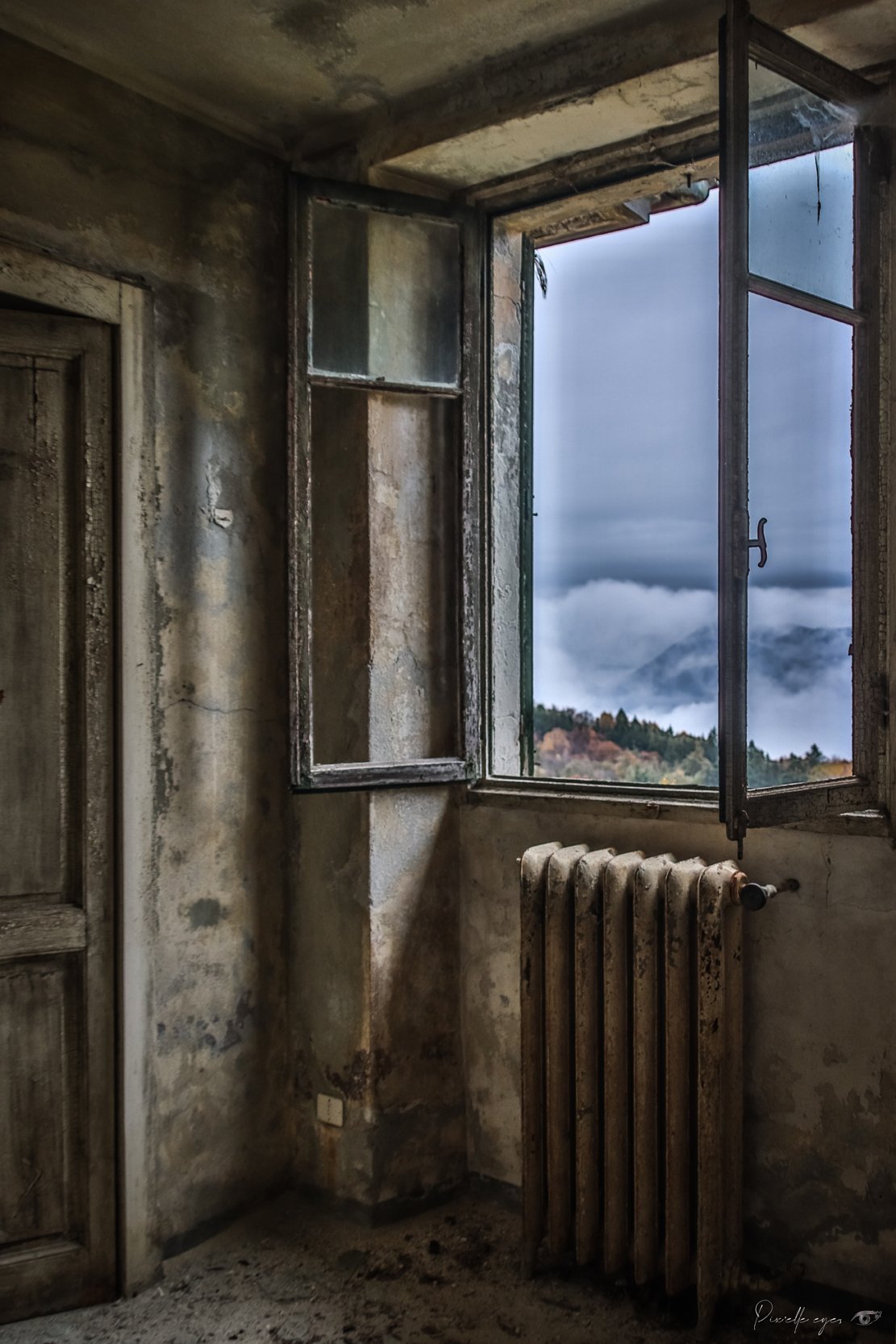 Forgotten Passage - Abandoned Window with Misty Mountain View product image (1)