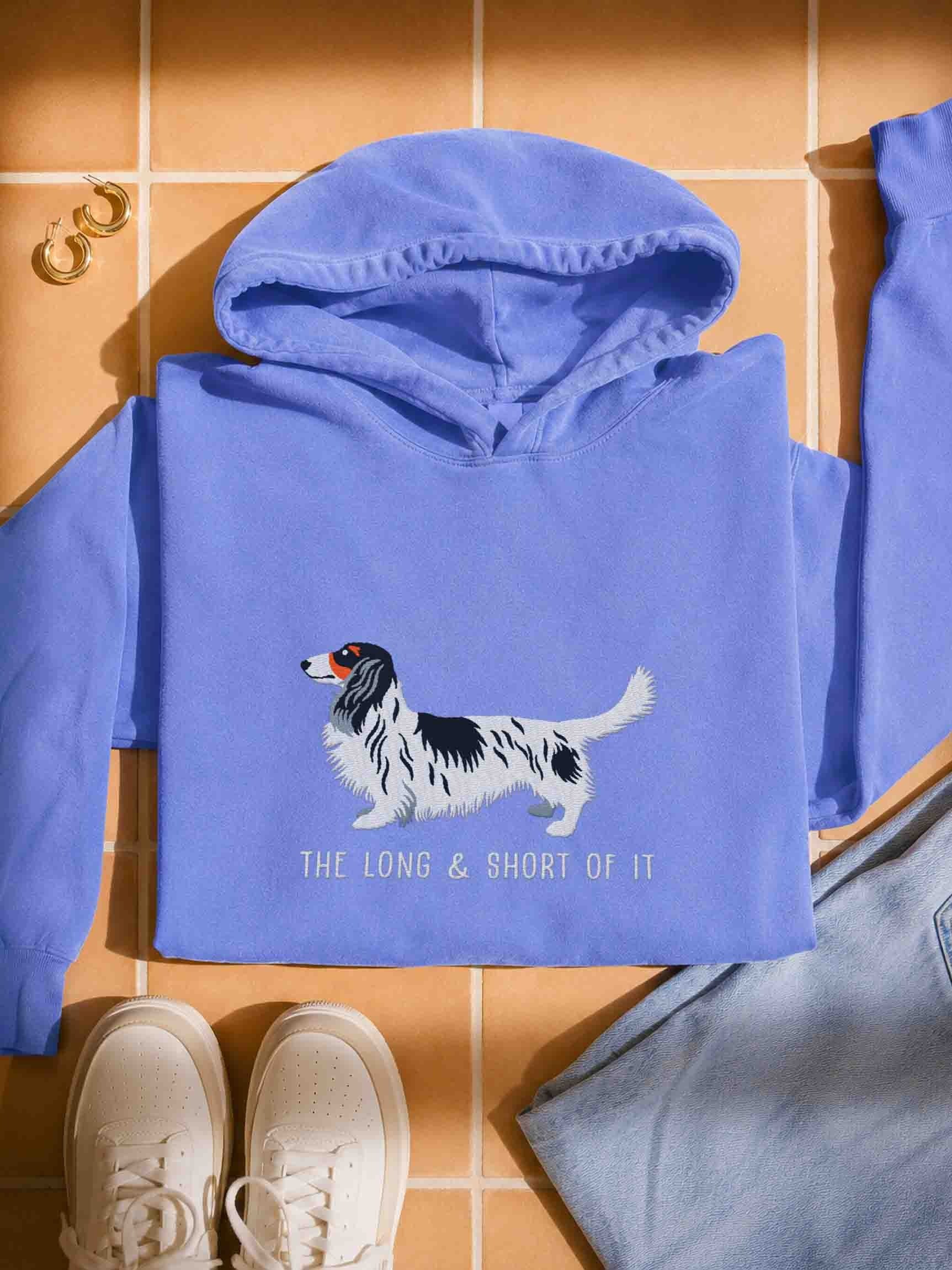 The Long & Short of It Premium Hoodie (Embroidered) of a Longhaired Dachshund(Pied Black & White) product image (1)