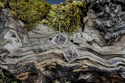 A touch of amethyst, a frame of textured silver, and just enough swing to feel flirty without trying too hard.
Jewelry for th...