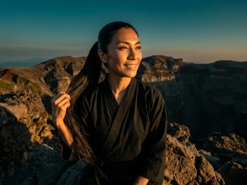 REN sitting on rock