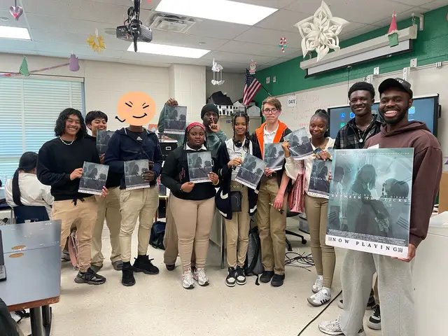 I celebrated Financial Literacy Month in six financial literacy classrooms at Duval High School in Prince George’s County. In a class where these students are already learning about budgeting, investing and saving money; I wanted to come in with a new concept: Money Scripts. Which are the unconscious beliefs that influence our perceptions and behaviors around money. Usually developed from our early childhood experiences. I sought to teach students that our decisions in life aren’t just about what we know, but  are impacted by what we believe. Our open discussions & activities encouraged them to challenge where their beliefs derived from. Parents? Friends? Social Media? Systemic Structures? To reinforce these ideas, I showed them a clip from my 2025 film “Between The Ticks.” From there, they worked in teams and developed their own stories that tackled money scripts like:  1. “I am what I own” 2.”Things will get better if I have more money” 3. “Talking about money is rude” 4. “If I don’t think about it, it’s not a problem” They had 15 minutes to create! Their stories not only chose one money script to focus on, but they created situations on how such beliefs could be formed in the first place. They utilized the time they had to create some amazing stories that they performed for each other (yes I had them stand in front of the class!). A lot of the stories centered on the struggles of fitting in, balancing wants and needs and how children can be impacted by the financial circumstances of their parents. Students practiced their creativity, public speaking skills and had the opportunity to put financial concepts in a real world social context. I awarded the best stories with little gold statues! We capped off the experience with a Q&A and me giving out posters of the film(with a QR code for the full film)! I wanted the students to leave with the understanding that what this class has taught them is only the beginning of their journey. The work and the reflection never stops. You just get better at managing it in your favor. Thank you Ms. Bullock for inviting me back to your classrooms. Hope to see you for Round Three next year! That’s Clearly Wealth, Neziah