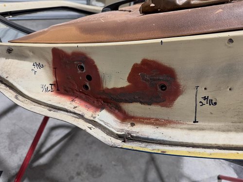 The notorious squarebody sagging door fix. There is a brace behind the sheet metal the door hinge bolts to that runs from the...