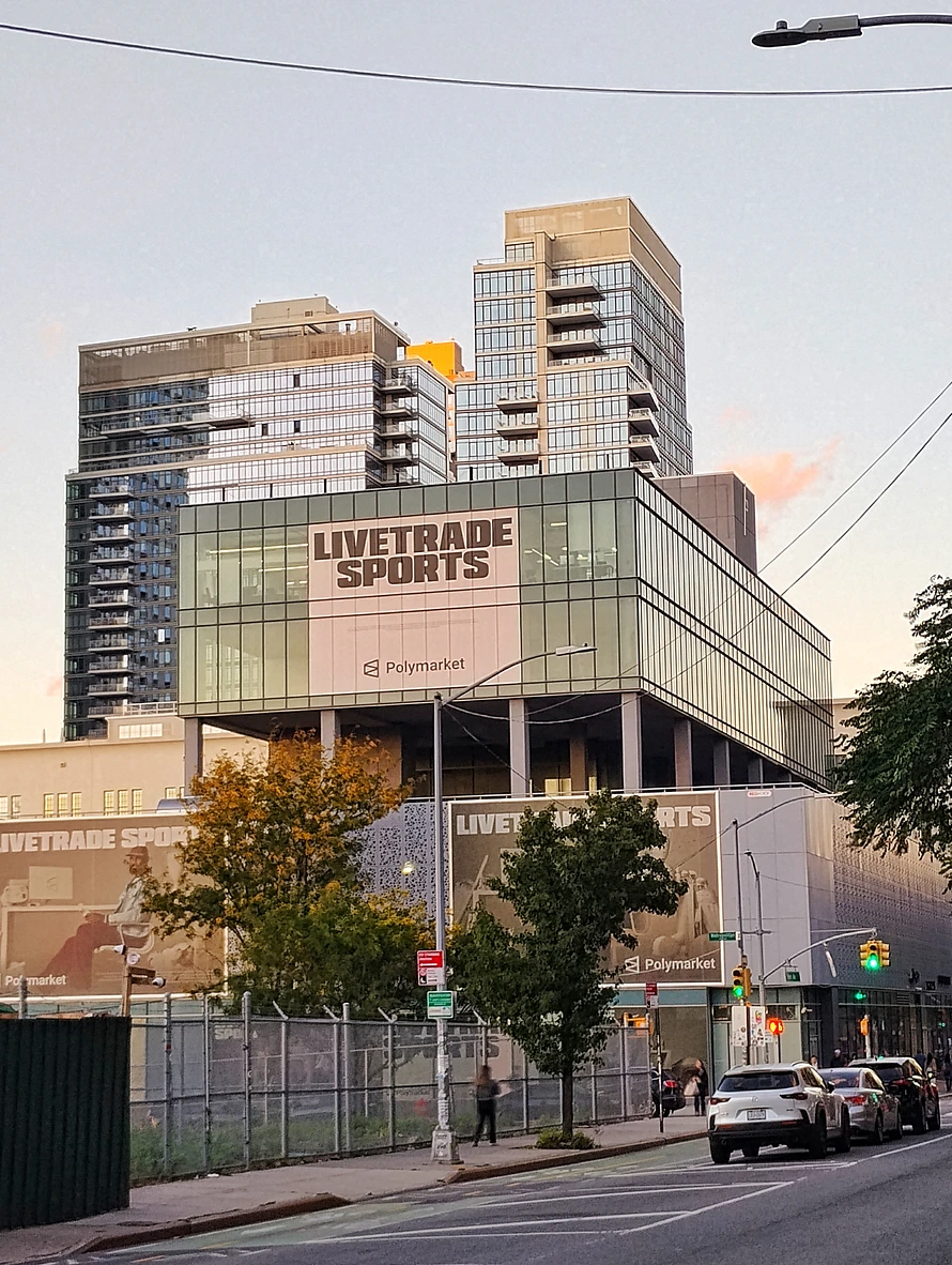 Ad for Polymarket on building in Williamsburg Brooklyn NY.