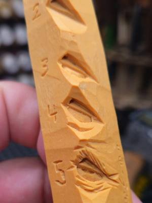 Step By Step Eye Carving Guide, Another Vintage Woodcarving Study Stick.  This one is from Chris Hammack and I cant make out the year on it.  Chris has a really indeifiable style and I absolutely love it. it had 5 steps for a caricature eye, and 3 steps for a cartoon style eye.  wondefully done, and a real treat. #woodcarving #whittling #caricaturecarving #stepbystep #woodart