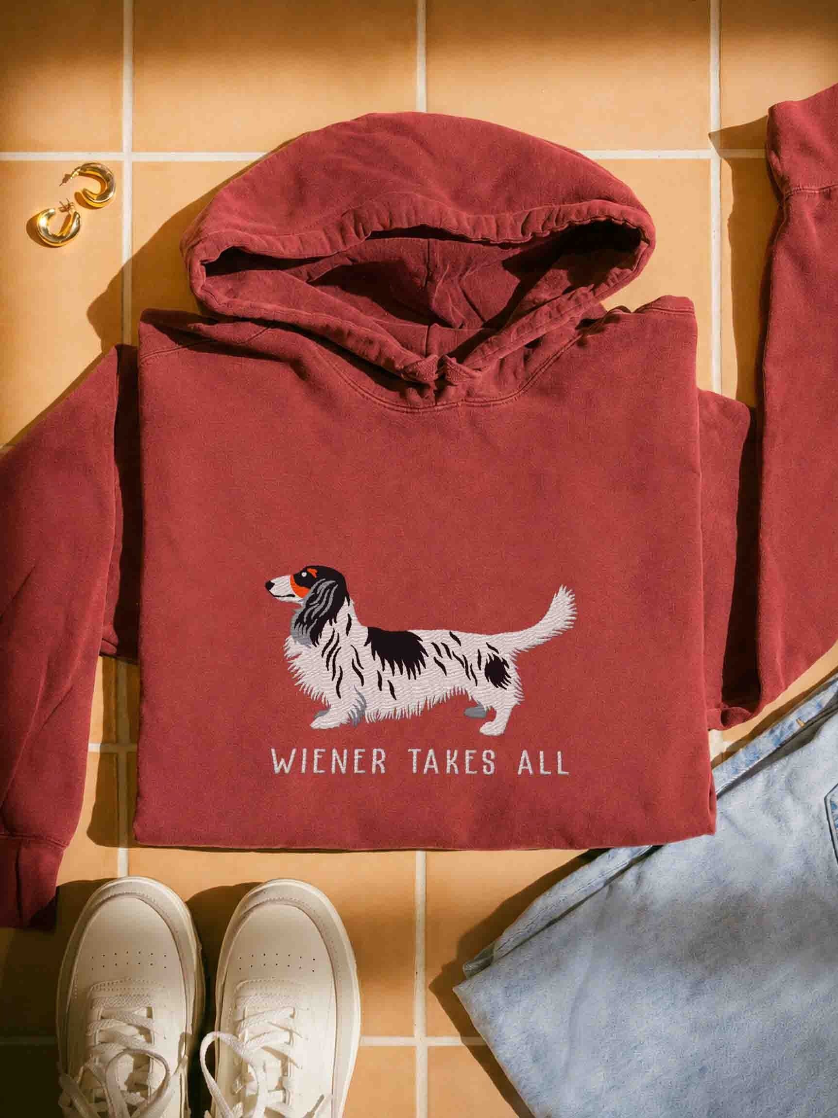 Wiener Takes All Premium Hoodie (Embroidered) of a Longhaired Dachshund(Pied Black & White) product image (1)