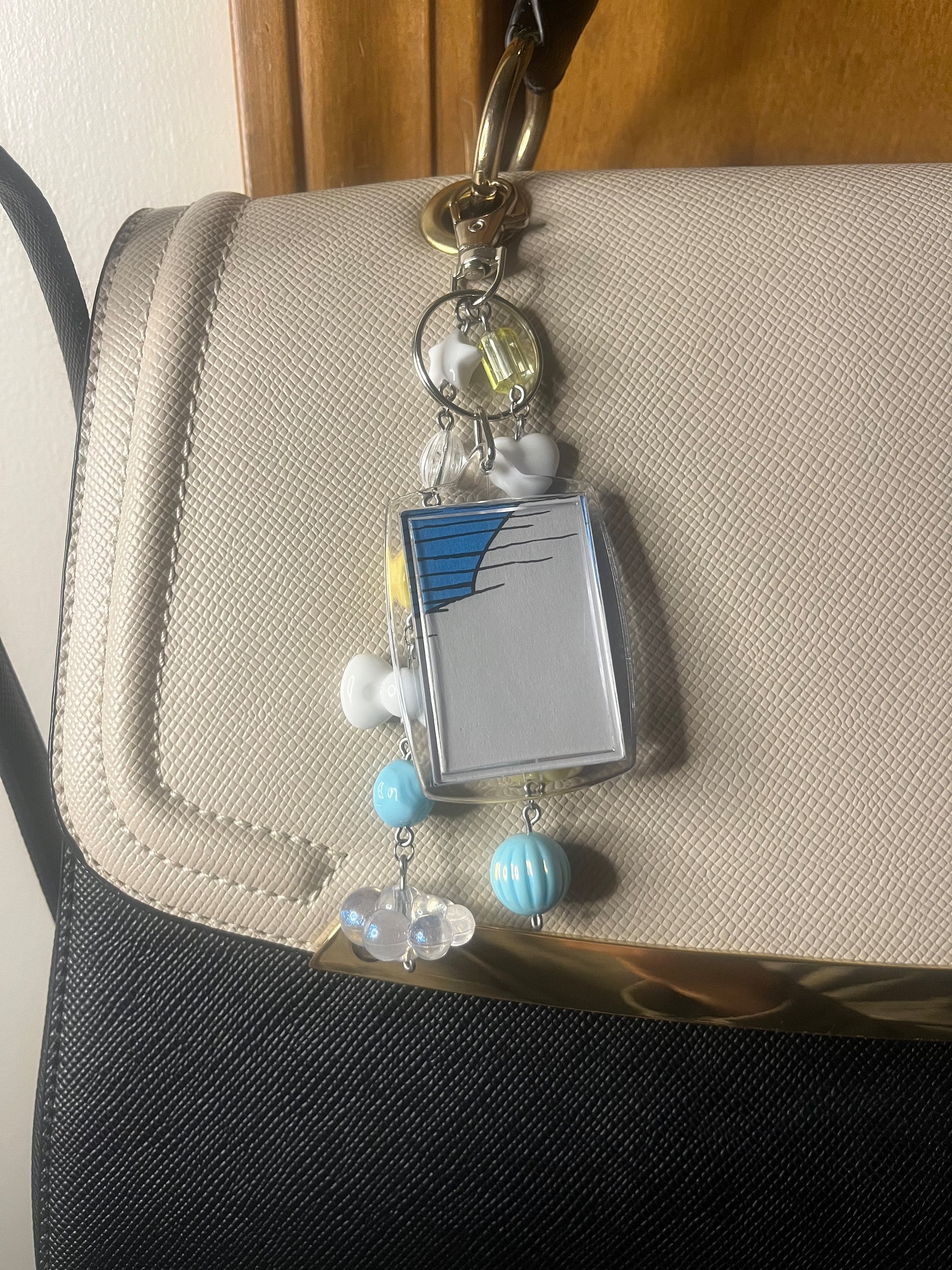 A Cloudy Sky In Thneedville Deluxe Bag Charm product image (5)