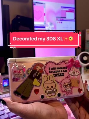 Decorating my 3DS XL! .ೃ࿔🌸*:･⋆.ೃ࿔* :･🌱⋆. I decided to decorate it using the bow, hearts, puffy sticker, and lovely designed stickers by my icon mangosweetteas (go check her out neowww) !! It came out so lovely 🥹💖🎊 This is different from my normal content as I usually try to film during the day, but I wanted to do a late night view of my space🥹💖💜. I’ve been playing Pokémon X and it’s been so much fun reliving my childhood!! #nintendo3ds #nintendo3dsxl #gamertiktok #stickers #desksetup 