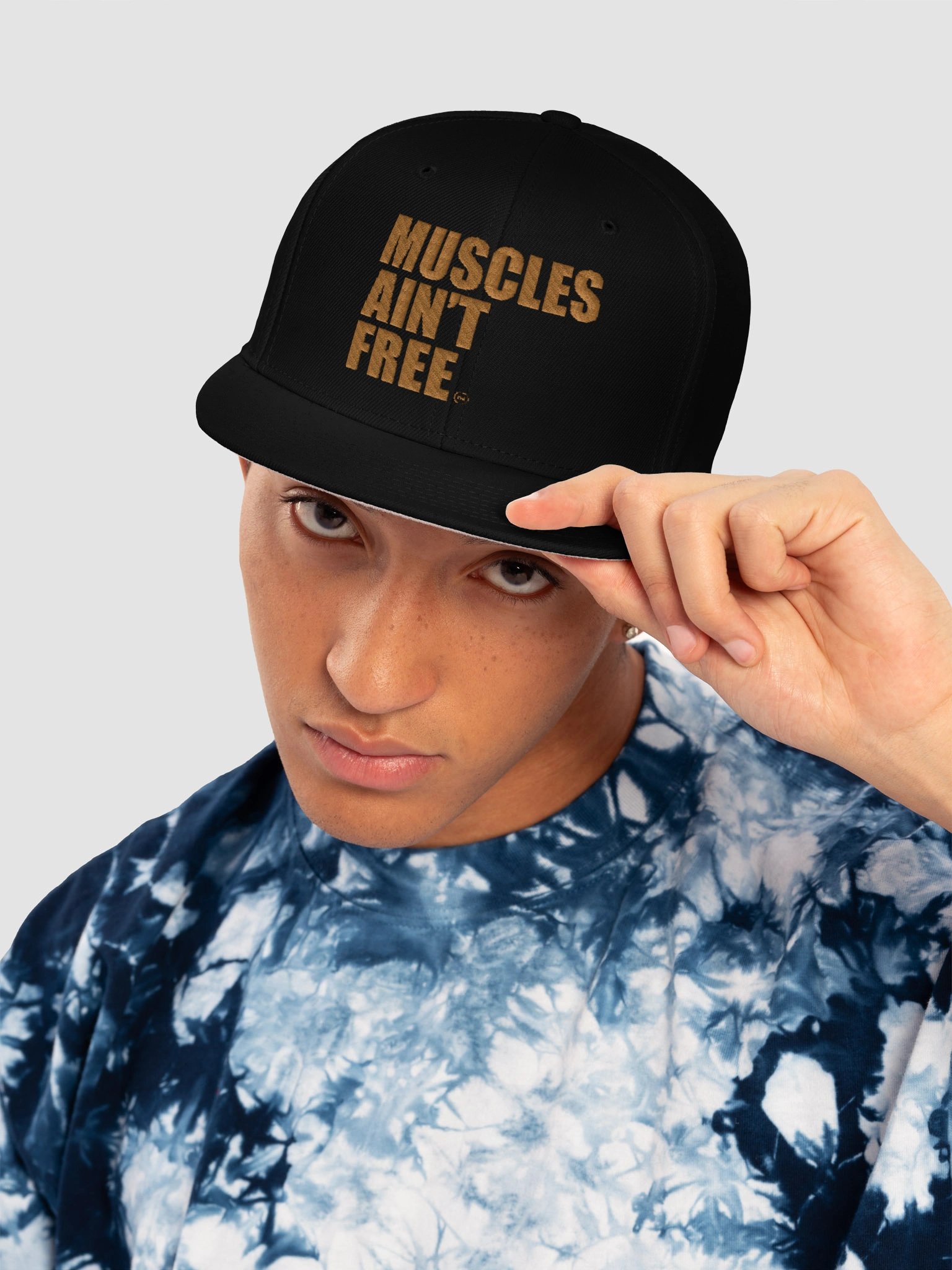 Product Title: The "Muscles Ain't Free" Minimalist Gold Flat-Bill Snapback Cap (Otto Cap) product image (73)