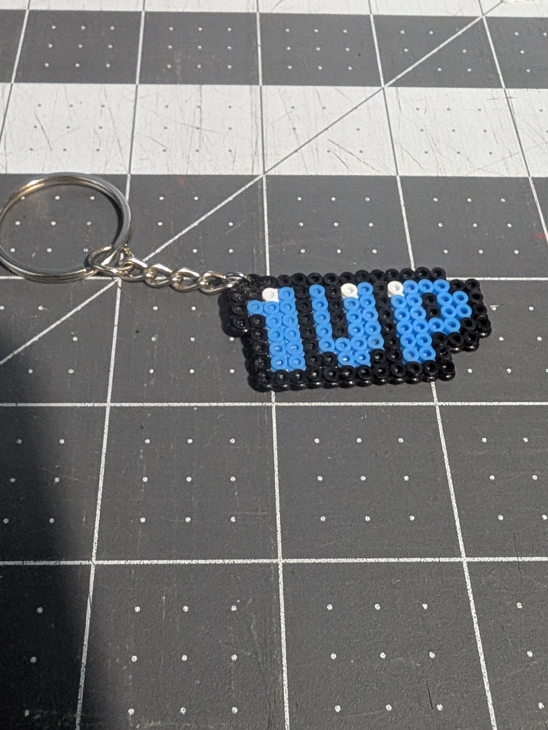 1 UP Keychain product image (1)
