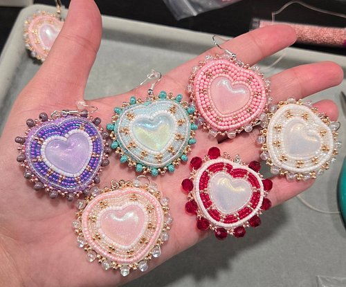 All the heart earrings together ❤️🤍💜🩷🩵

Gonna get some pics to list them later this week when the rain stops ⛈️

#beadwork #i...