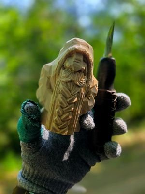 Hand carved dwarf, 4 inches tall, carved from 2inch by 2inch square basswood stock. (linden in europe). Whittling / Woodcarving is a fantastic hobby. You need several things, a sharp knife, a leather strop with compound for honing your blade, safety gloves (A5 or better) and basswood (to carve like i do at least.) Why Basswood?  Its softer than other hardwoods and holds detail well.  Learning to carve with basswood is akin to learning to drive on an automatic. It simplifies and streamlines learning.  Woods like Walnut and oak can be carved,  but learning to carve with them as the starting point is like learning to drive on an 18 wheeler Semi Truck with manual transmission.  Its needlessly difficult.  Good knife brands to Start with are, Flexcut,  Badger State Blades (Usa), Mstein (Europe).  Stay away from the 