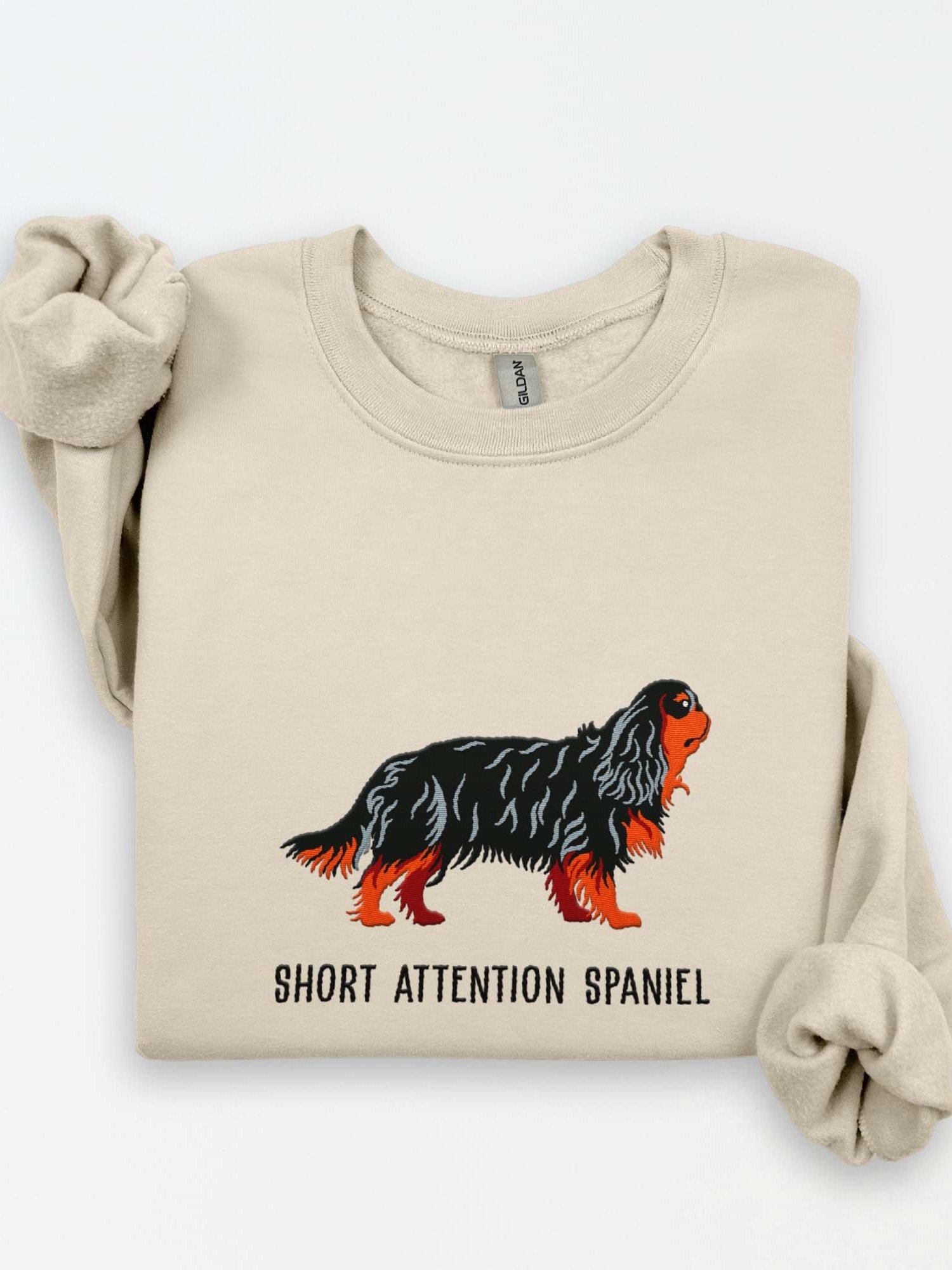Short Attention Spaniel Sweatshirt (Embroidered) of a King Charles Spaniel(Black & Tan) product image (1)