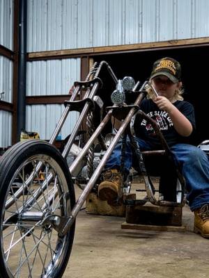💀 START 'EM YOUNG. 💀 ​We said the sissy bar was up next, so we got the torch out, twisted up some metal, and called in the best weld tech in the shop to help lock it down. 🛠️⚡️ ​The clock is ticking down to the Sturgis Buffalo Chip Custom Mini Series hosted by the Onery One at Camp Zero August 11th, but we’re making sure the next generation knows exactly what it takes to build a chopper from the ground up. ​Hood down, gloves on, and burning wire. Rate the little man’s first custom build fabrication skills! 👇 ​Drop a 🔥 if he killed it under the hood! ​#campzero #chopper #sturgis #minichop #theorneryone 