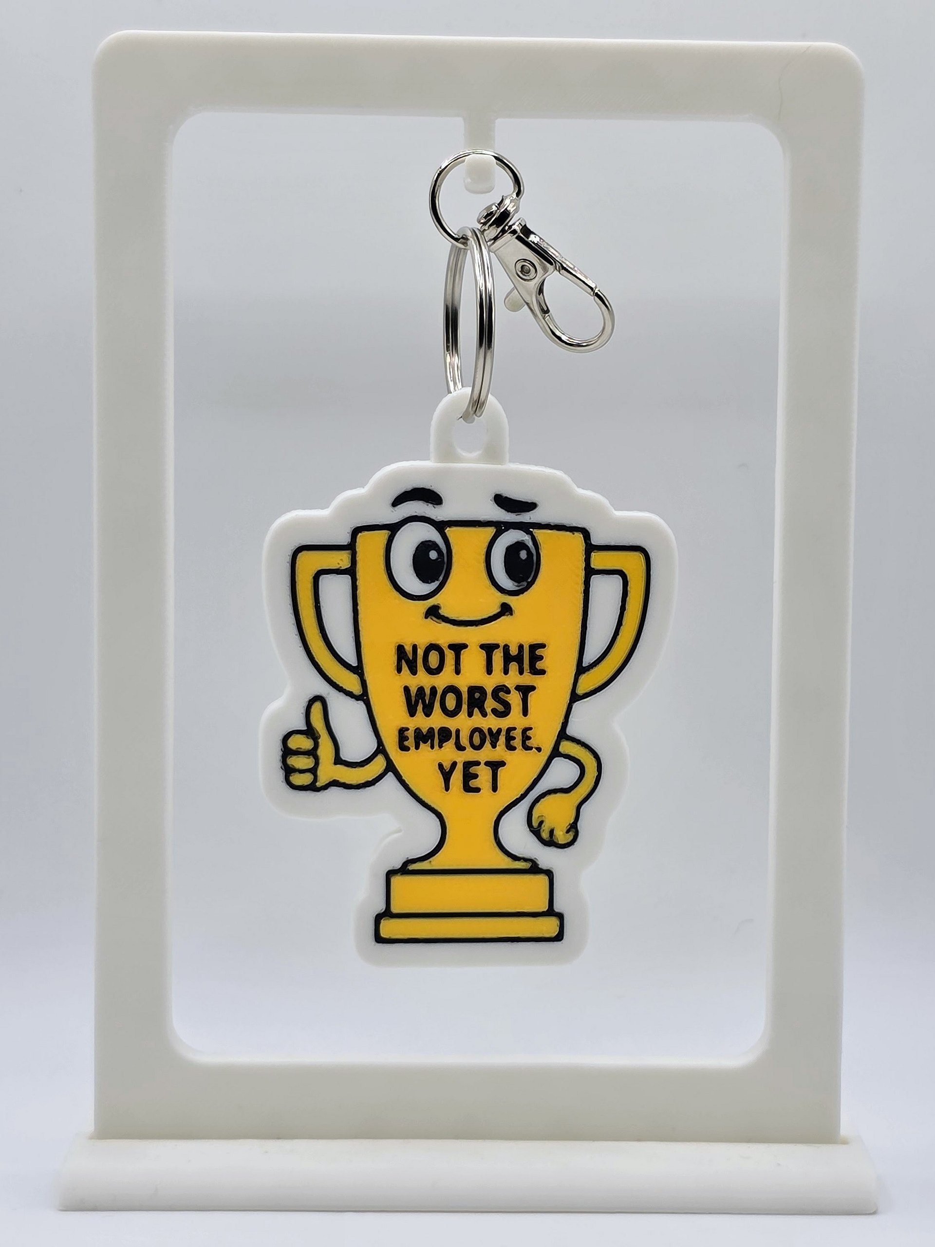 🏆 “Not the Worst Employee, Yet” Trophy Keychain product image (1)