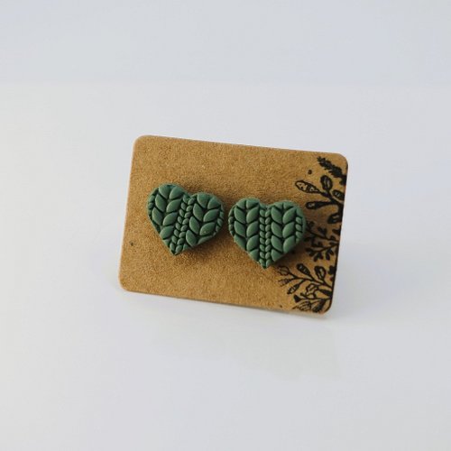 Knit Your Heart Out now has two new colors: sage green and navy! The knitted texture on these little stud earrings is really ...