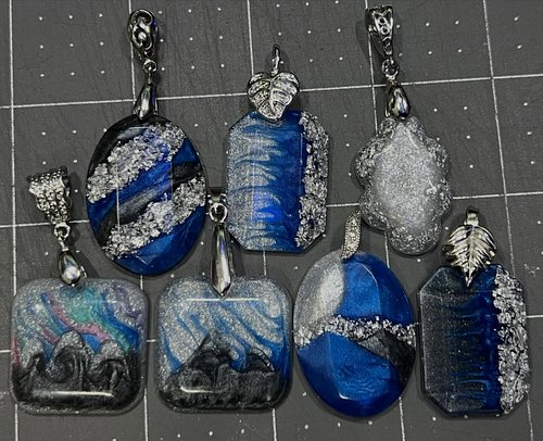 Some more completed resin jewelry.