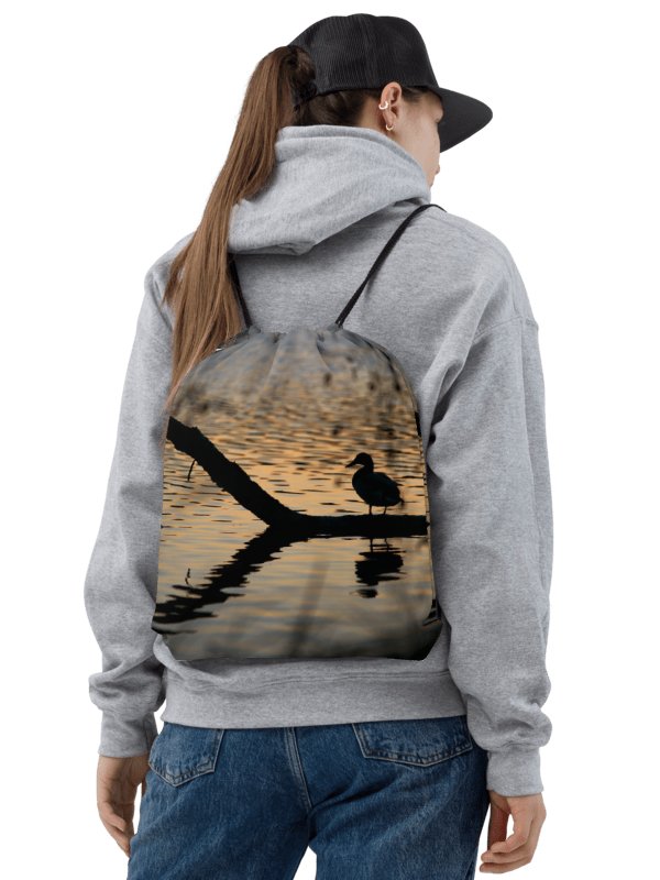 Drawstring bag - Silhouette of a duck on a branch in the water product image (2)