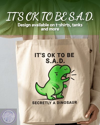 S.A.D. Dino is for the days when your feelings feel too big to carry quietly.

Sad, soft, messy, heavy. All of it belongs her...