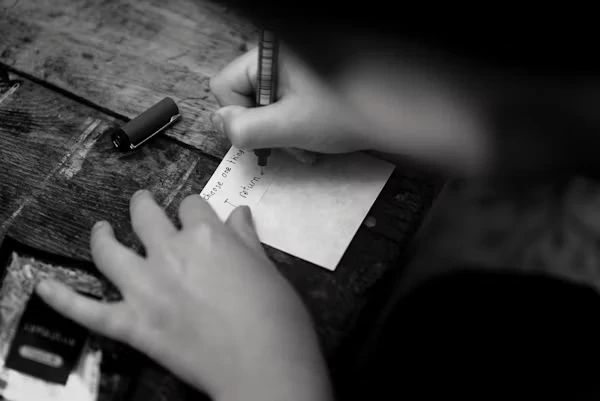 Daniel Emerson the Endgame Coach writting out list clearly to execute