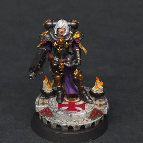 This beauty was a blast to paint. I am really starting to like the whole Sisters of Battle. My client has picked a fun color ...