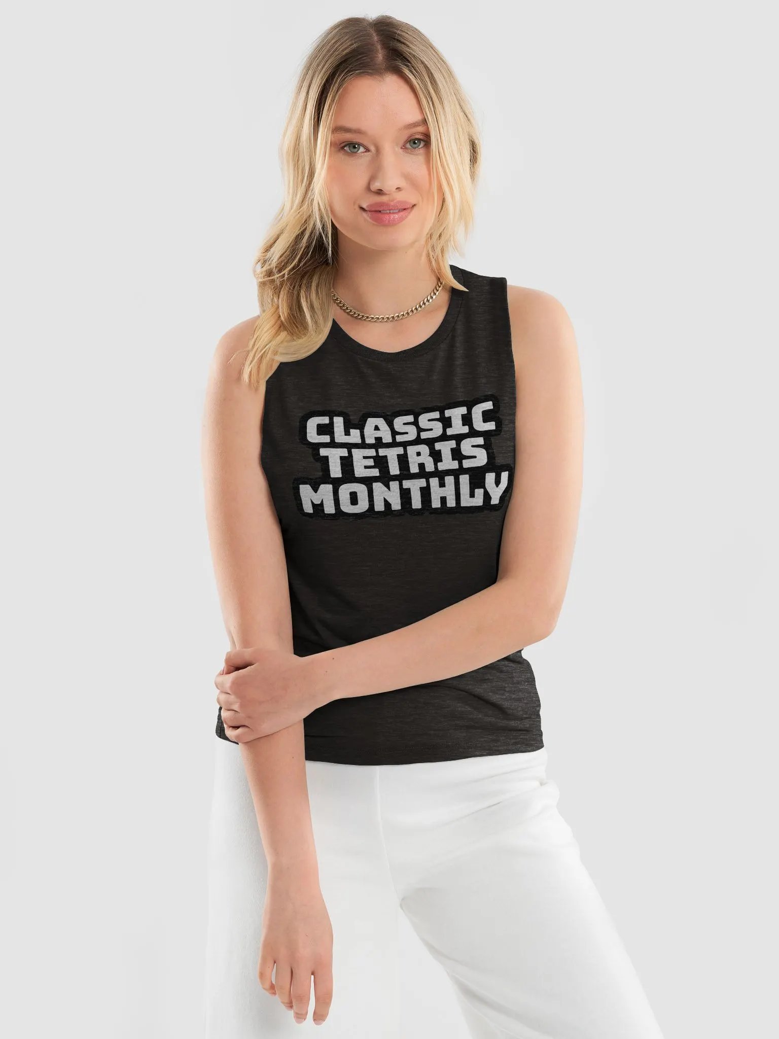 A "ladies flowy muscle tank" product image (3)