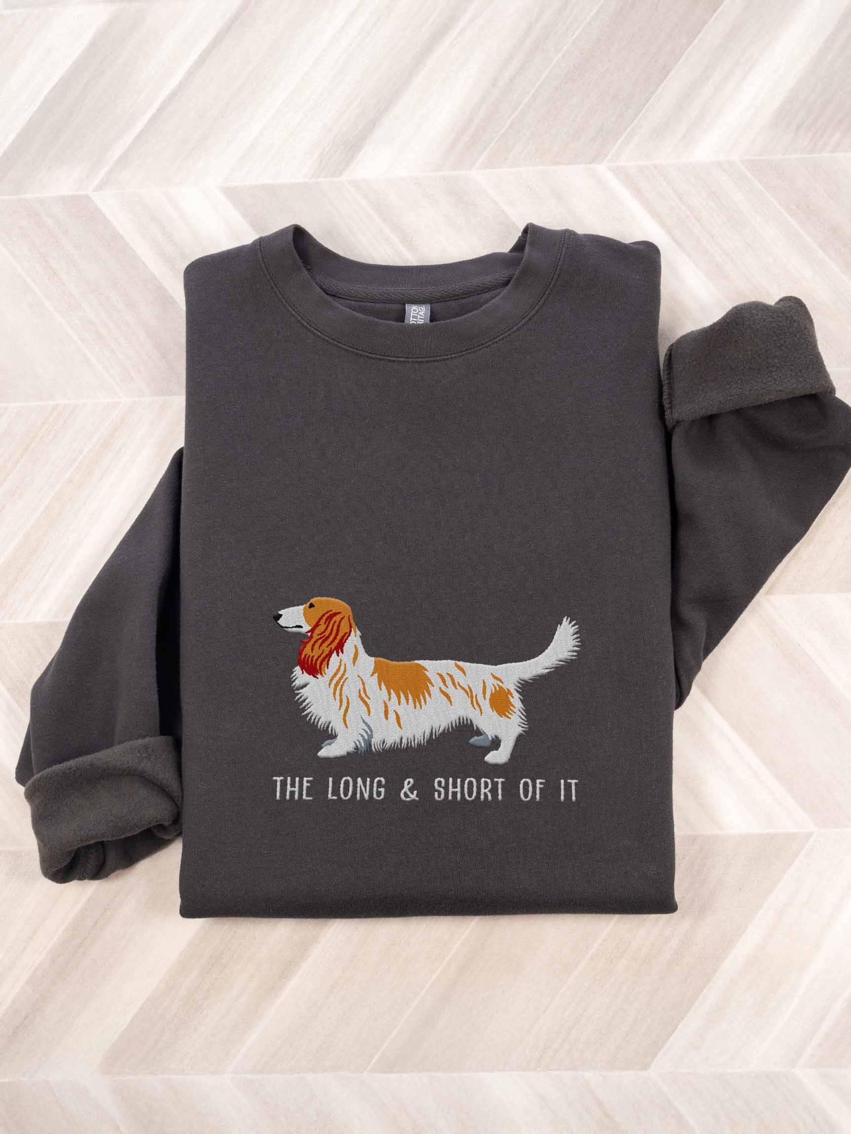 The Long & Short of It Sweatshirt (Embroidered) of a Longhaired Dachshund(Pied Brown & White) product image (1)