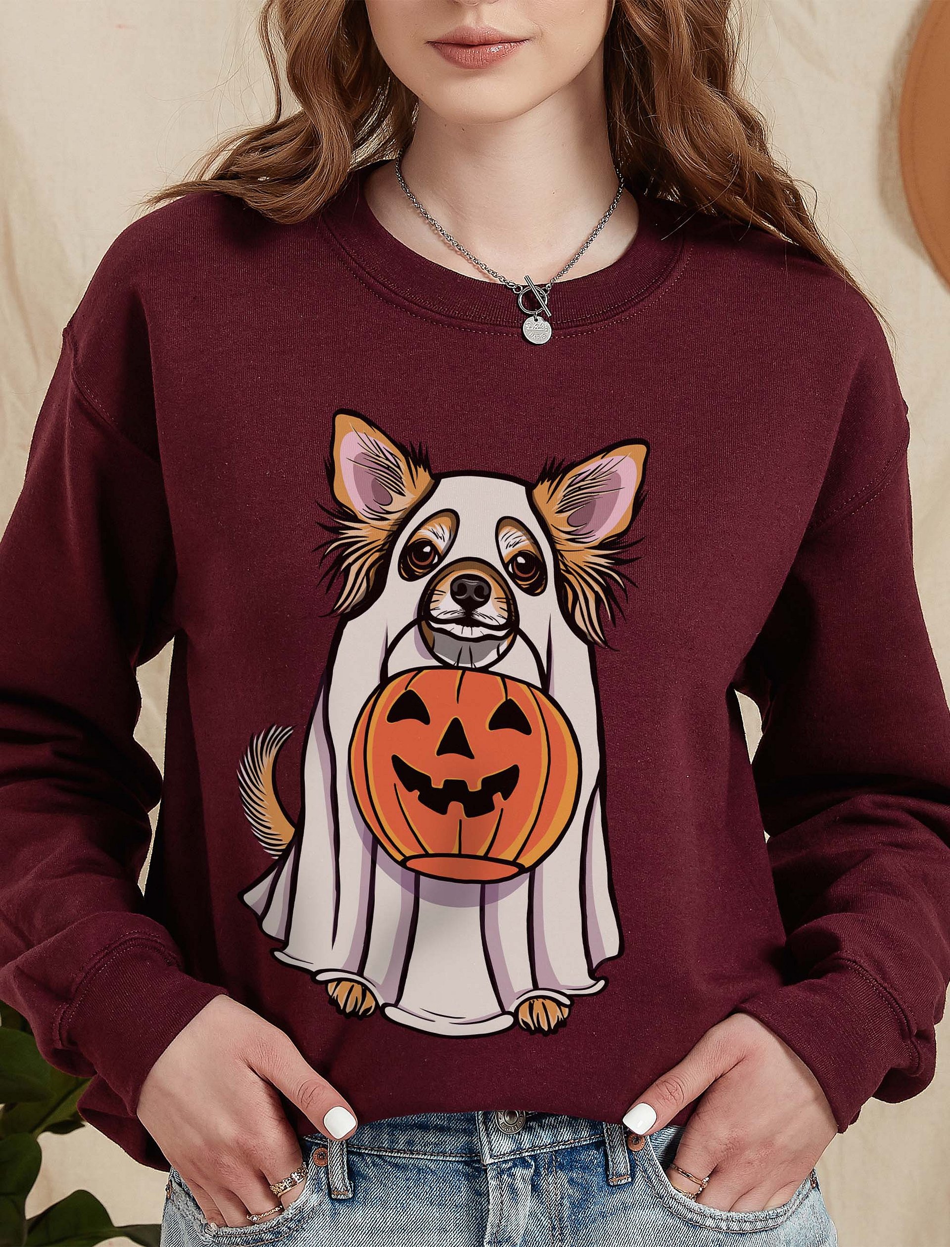 Funny Halloween Longhaired Chihuahua Sweatshirt | Funny Chihuahua Wearing a Ghost Costume and Holding a Pumpkin Basket product image (2)