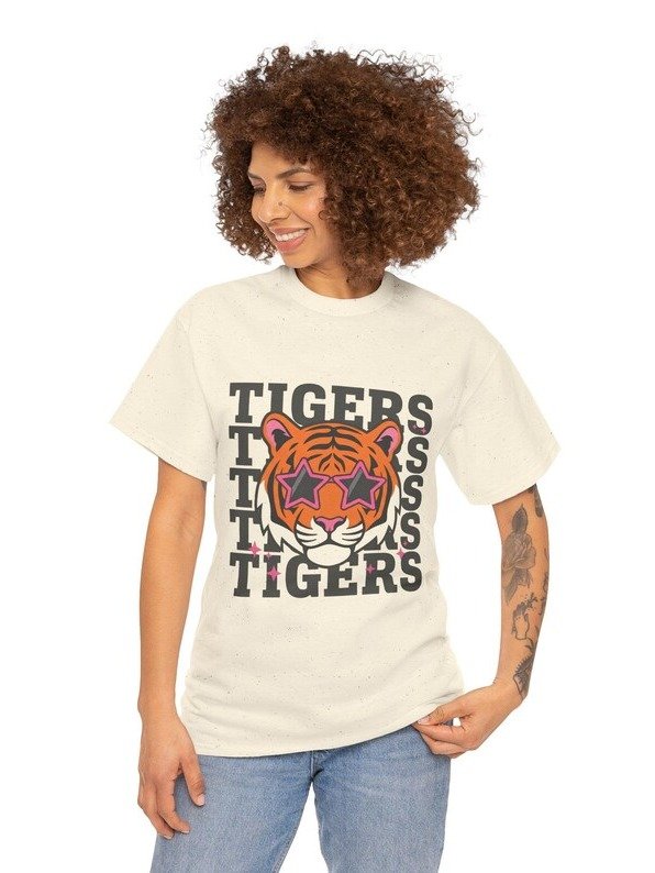 This lightweight cotton tee carries a cozy, spooky energy — a layered Halloween scene where a grinning jack-o’-lantern crowns a skeleton, bat wings unfurl behind, and playful ghosts and a haunted hous product image (89)