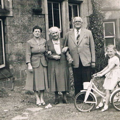 My mum, on the bicycle. 
Her grandmother on the left. And Great grandmother/grandfather.
Going a long way back.
But people wi...